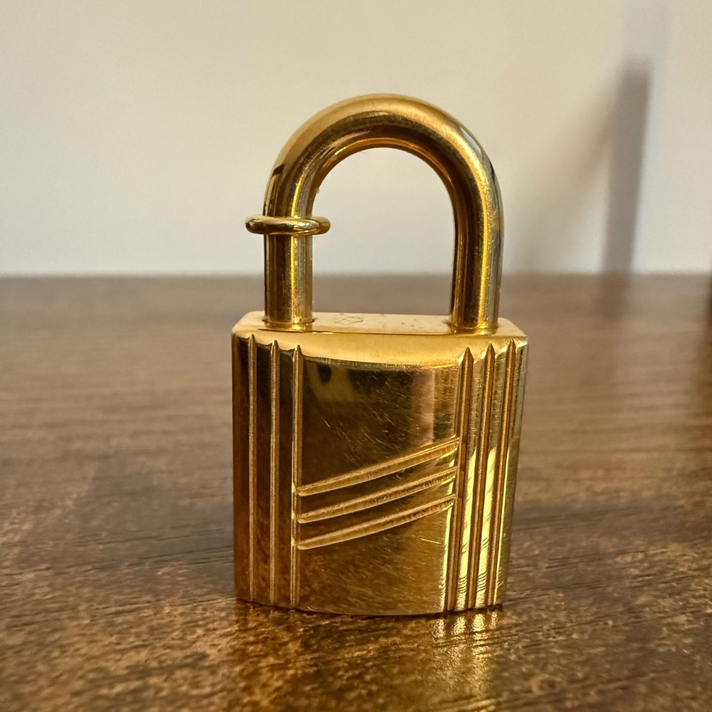 Hermes Annee Arbre Gold Tone Padlock Charm